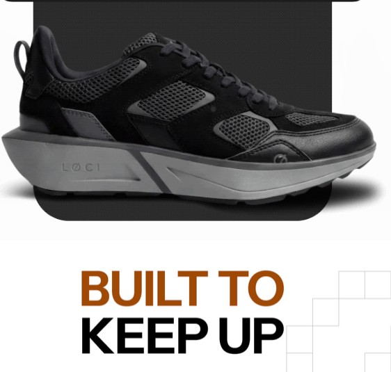 Black athletic sneaker with chunky gray sole